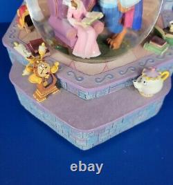 Beauty and the Beast Library Disney Store Snowglobe. Belle reads as old as time