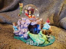 DISNEY'S PETER PAN & CAPTAIN HOOK MUSICAL SNOW GLOBE that plays You Can Fly