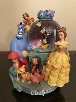 DIsney Store Through the Years Musical Snow Globe Bookend Set Volume 1 & 2