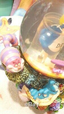 Disney Alice In Wonderland Drink Me Snow Globe All in the Golden Afternoon
