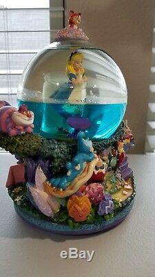 Disney Alice in Wonderland Drink Me Snow Globe All in the Golden blue water