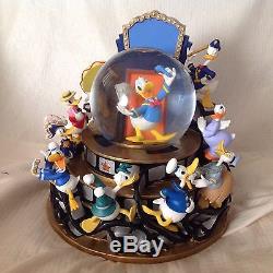 Disney Donald Duck THROUGH THE YEARS Lrg Musical Lights Up Motion SnowGlobe-MIB
