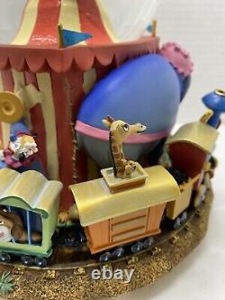 Disney Flying Dumbo with Train snow globe plays Casey Junior Tune