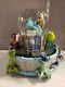 Disney Monsters Inc. Musical Monstropolis Snow Globe with Mike Sully & Boo