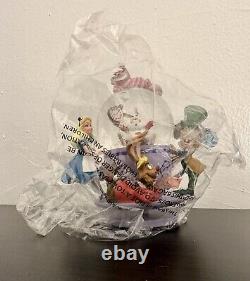 Disney Parks Alice in Wonderland Snow Globe Spinning Tea Cup Collectible