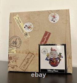 Disney Parks Alice in Wonderland Snow Globe Spinning Tea Cup Collectible