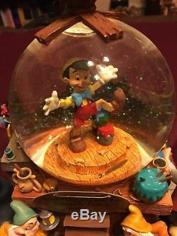 Disney Pinocchio Share Dream Come True Parade Musical Rotating Snow Globe