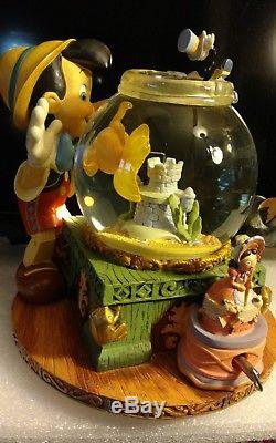 Disney Pinocchio Snow Globe RARE Toyland Musical/Animated