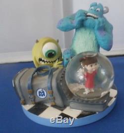 Disney Pixar With Snowglobe
