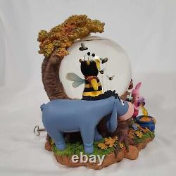 Disney Pooh in Bee Costume Perched in Light Up-Liquid Honey Musical Snow Globe