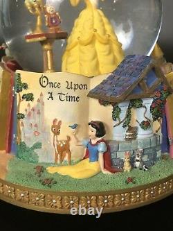 Disney Princesses Story Book Rotating Snow Globe. Belle