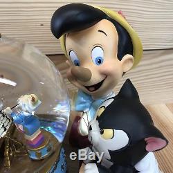 Disney Store Snowglobe Pinocchios Music Box Brahms Waltz Musical Spinning Figaro