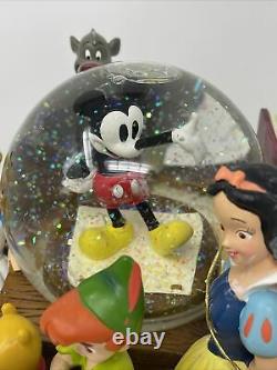 Disney Store Through The Years Vol. 1 Musical Snow Globe and Bookend