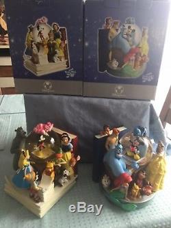 Disney Through The Years Bookend Snowglobes