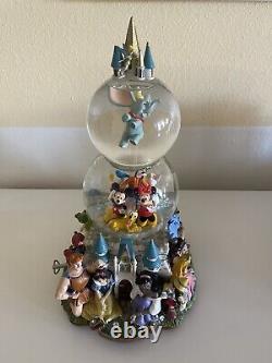 Disney World character parade snow globe featuring spinning Dumbo RETIRED