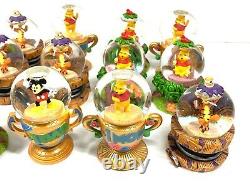 Disney lot of 18 Mini Disney Snow Globes. Mickey, Tigger Winnie The Pooh