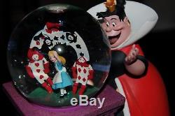 Disney queen of hearts rotating snow globe / alice in wonderland Rare