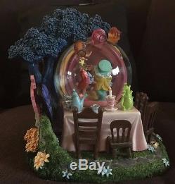 Disney's Alice in Wonderland's motion, musical, and lit Tea Party snowglobe