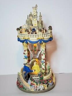 Disney's Beauty and the Beast hourglass light up musical castle snowglobe