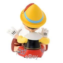 Disney store Japan Snow Dome music box with Pinocchio Jiminy Cricket Glove fig