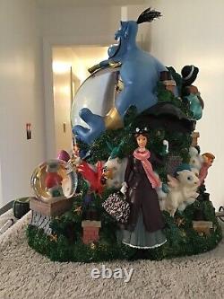 Disneys Share A Dream Come True snow globe featuring Genie from Aladin
