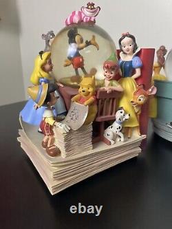 Disneys Wonderful World of Disney set of 2 Book End Snow Globes