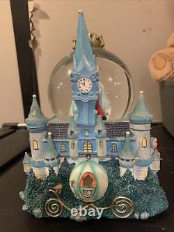 Disneys cinderella/prince Charming Castle snow globe Rare/retired