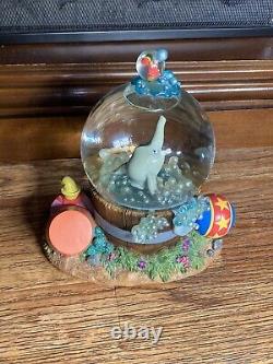 Dumbo Takes a Bubble Bath Disney Store Snow Globe Works Rock a Bye Baby
