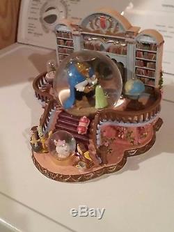 Mint condition rare disney library beauty and the beast snowglobe