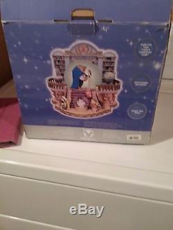 Mint condition rare disney library beauty and the beast snowglobe
