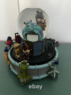 RARE Disney Store Monsters, Inc. Snow Globe
