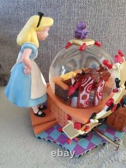 Rare Disney Alice snow globe