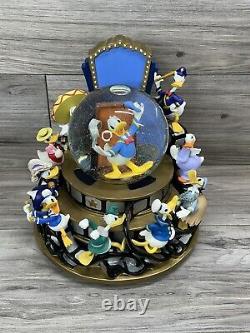Rare Disney Donald Duck Through the Years Snow Globe in original box