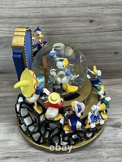 Rare Disney Donald Duck Through the Years Snow Globe in original box