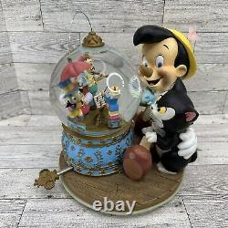 Rare Disney Pinocchio and Figaro Magic Musical Snow Globe Brahm's Waltz