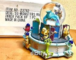 Walt Disney Pixar Monsters Inc Musical Snow Globe Monstropolis Snowglobe in Box
